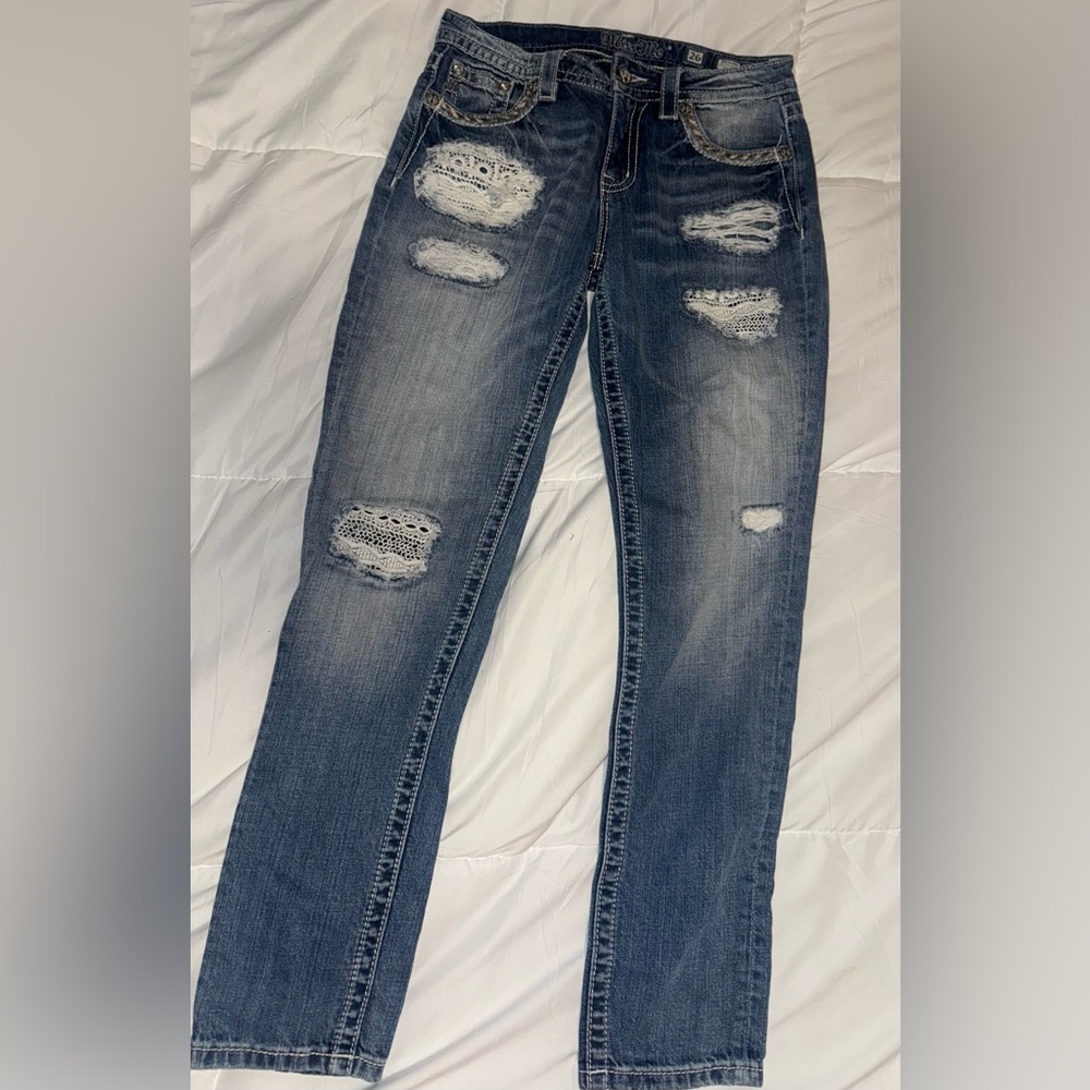 Distressed Blue Jeans